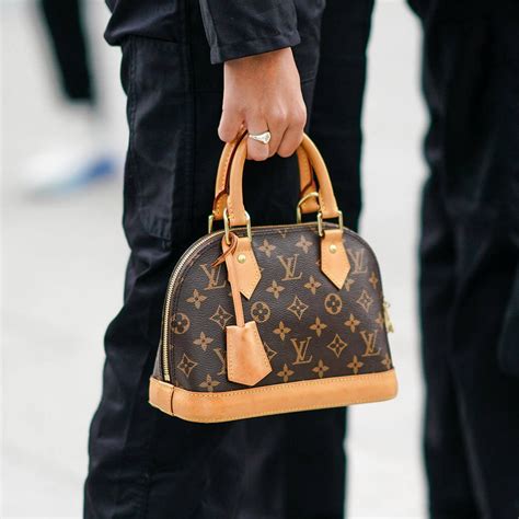 m51127 louis vuitton|Louis Vuitton alma tote bag.